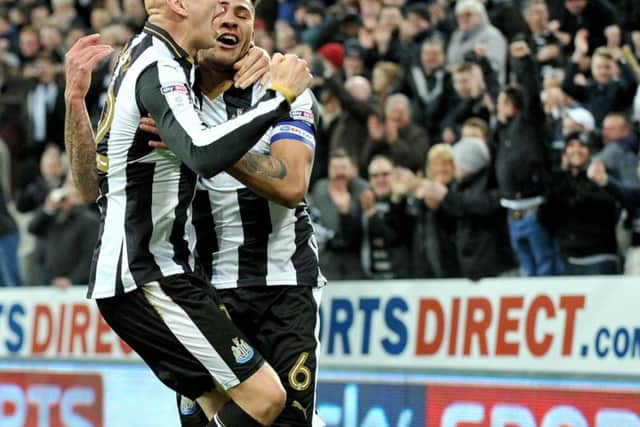 Jamaal Lascelles celebrates Newcastle's second goal last night.